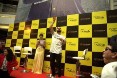 Virat-Kohli-India-Cricket-Captain-with-Mandira-Bedi-celebrity-and-host-interacting-with